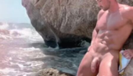 Spanish stud teasing on the beach