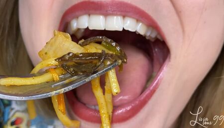 Closeup Chinese takeaway dinner chewing (noodles, rice, chicken)