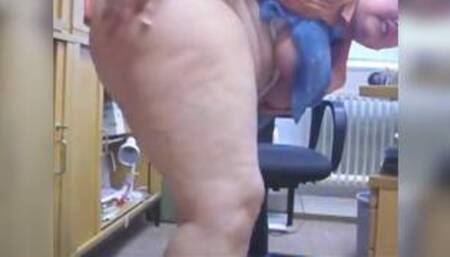 Office girl teases in her office