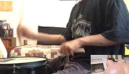 Girl Riding Dick While Playing Drums