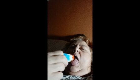 Red white and blue sucking a bullet pop for You ! wmv