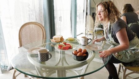 Stepmom helps stepson cum at the breakfast table