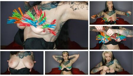 Tattooed, kinky girl hangs the maximum number of clothespins on her big tits