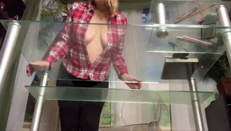 Braless tease wearing a button up