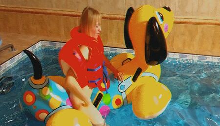 Alla naked fucks a big tight inflatable puppy in the pool and gets a hot orgasm!!!