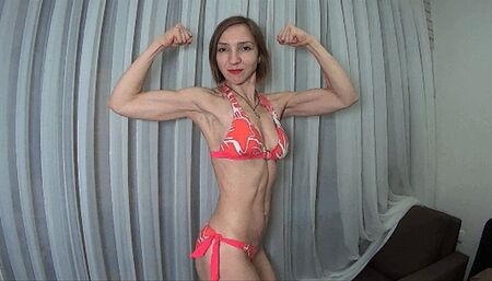 Muscles posing in bright bikini (MW)