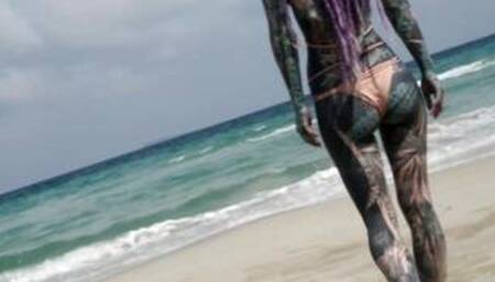 Heavily tattooed dreadlocks Anuskatzz holiday ocean tease with Lily Lu