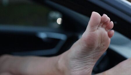 Resting Feet out of the Car Window