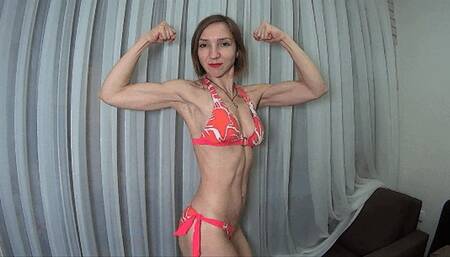 Muscles posing in bright bikini (M)