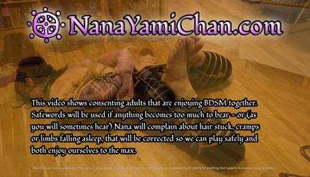 Girl struggling in hogtie on floor, masturbating with crotch rope