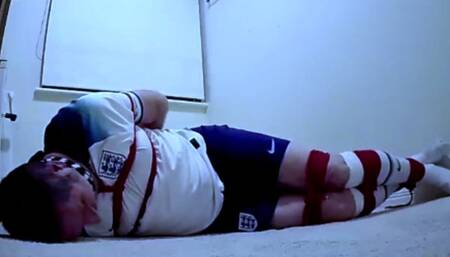 Masturbating voice over a struggling bound and gagged man