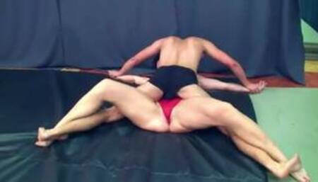 Mixed wrestling -strong female overpowered (grapevine pin)