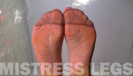 White Stockings Over Flesh-Colored Pantyhose Teasing On Glass Table (MOV HD)