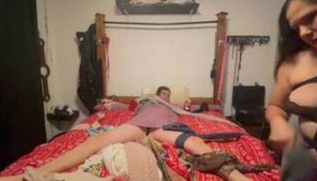 Femdom scarf bondage tied to bed by mistress