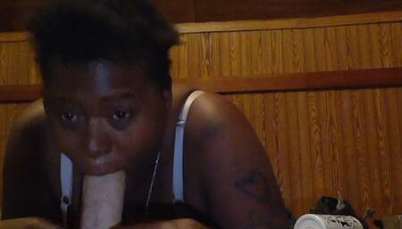 Lubricating her dildo