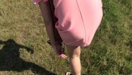 Naughty girl taking off her panties and flashing her fanny in public