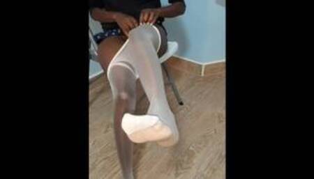 Ebony wearing her shiny Nylons