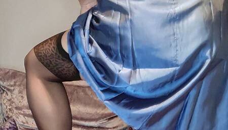 Hot crossdresser in blue satin stockings and suspenders