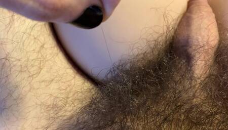 An extra look: off my ridiculously long pubic hair while my flaccid uncut dick waits between silicone tits (sex toy)
