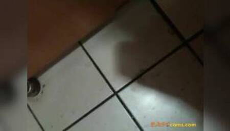 Korean girl sucks cock in a bathroom gloryhole and gets cum