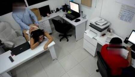 Girl boss fucks her coworker next to the assitent