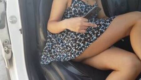 Upskirt college girl getting into uber taxi.