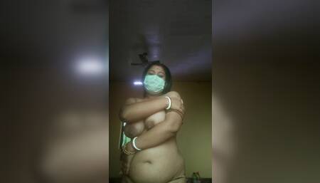 An Indian women showing her big nipples and big ass while she was alone at home