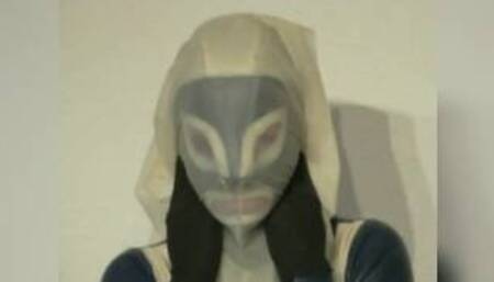 Girl In Blue White Latex Catsuit Mask Plays Breath Play With Rubber Sheet