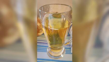 Spit cum and pissing tons of pee in a glass