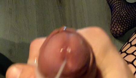 close-up cumming on the couch in fishnets body