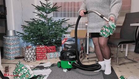 Mila - Christmas gift tryout - feeding paper and plastic to Henry