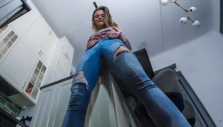 Wetting her Jeans by accident
