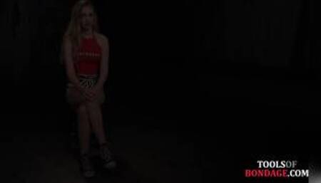 Gagged bondage subject clamped by dom during punishment