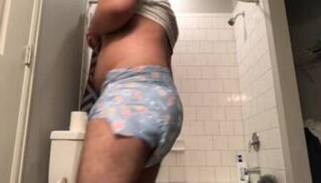 Chubby cub explores diapers