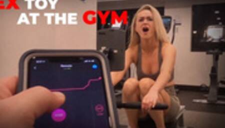 Sexy Girl Working out with Remote Control Sex Toy in Public Gym