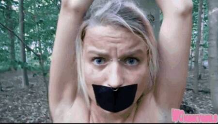 Bondaged young girl outdoor in the woods gets punched her tits