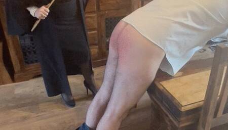 headmistress gives a caning