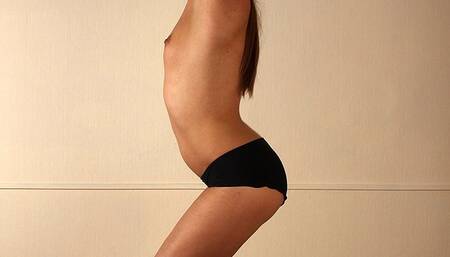 Gloria: topless ballgagged barefoot girl stands on the floor with her hands tied above, and her friend spanks her (HD MP4)