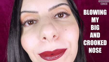 BLOWING MY BIG AND CROOKED NOSE