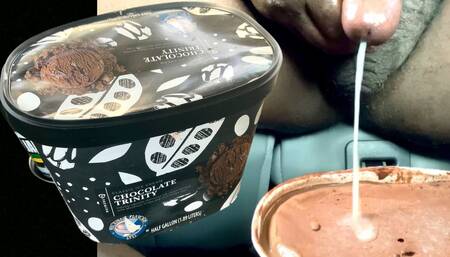 Black man jerking off black cock to massive cum load in ice cream