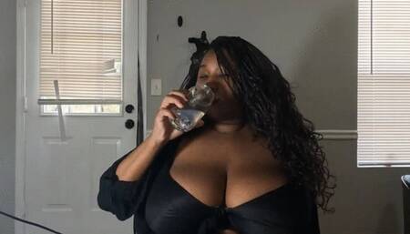 Giantess Enjoying her Favorite Drink