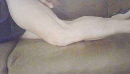 Flexing on leather couch