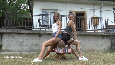 Dyanna and Tatjana are playing in the garden! Face sitting