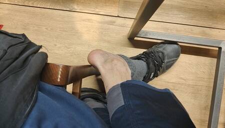 I take off my socks at the mall