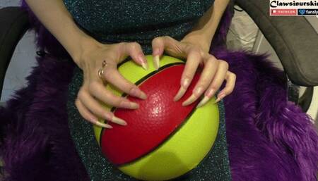 Aggressive nail scratching to burst and destroy 5 balls
