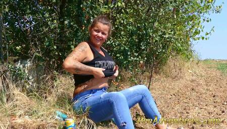 Pee in a corn field - Crossing her legs to calm her full bladder and wet her jeans in the heat outdoor