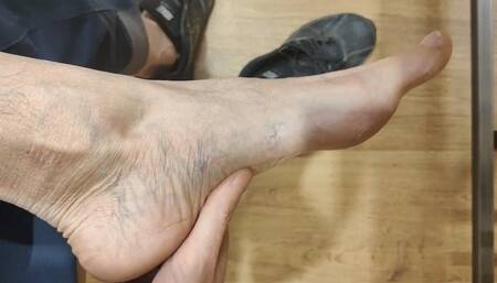 Foot play and shoeplay with sneakers (avi)