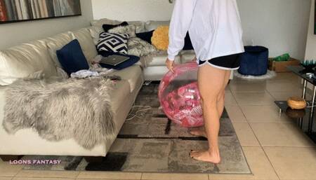 Playing and deflating my beach ball
