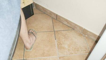 Playing in flip flops under the desk