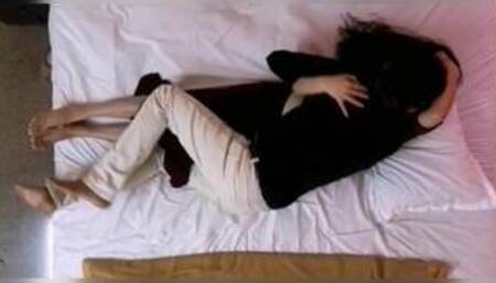 Indian couple romantic mood on bed